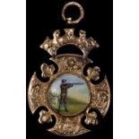 An attractive 9ct gold shooting medal, obverse crowned cross with enamelled plaque showing gentleman