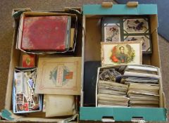 A large quantity of early to mid 20th Century postcards and cigarette cards, etc. Including: 2x