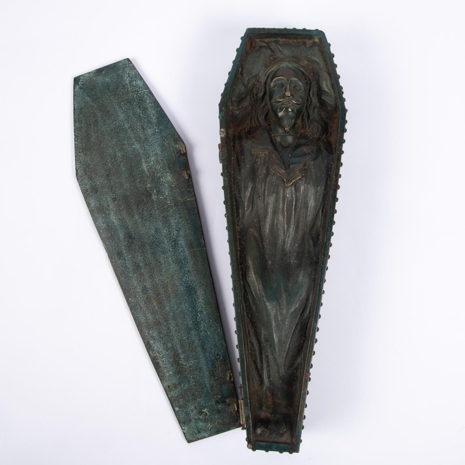 A cast bronze model of a heavily studded coffin with hinged studded lid containing the body of - Image 2 of 4