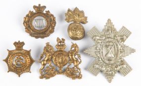 Victorian cap badges of the 13th Hussars, Army Service Corps and Boer War Home Counties Reserve