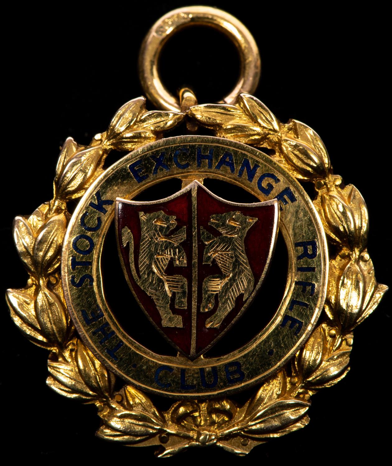 The Stock Exchange Rifle Club, an attractive 9ct gold and enamel shooting medal, obverse central