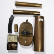 A 105mm WWII brass shell case, dated 1943; 2 40mm AA shell cases; a PPSH drum magazine; also a small