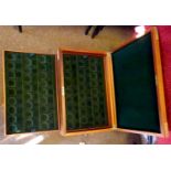 A custom made brass bound wooden chest to house a collection of medallions, 21½" x 14" x 5", with