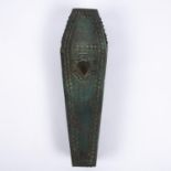 A cast bronze model of a heavily studded coffin with hinged studded lid containing the body of