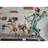 Large Art Deco lady figure walking two borzoi type dogs.