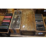 Four wooden boxes of antique glass magic lantern photographic slides, various subjects; travel,