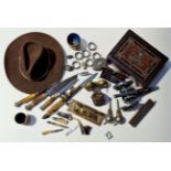 A box of collectables to include pen knifes, cowboy hat, trinket boxes, horn handled knives, hoof