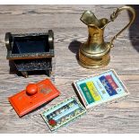 2 boxes of Chinese ink sticks, red lacquer ink blotter, metal censor, brass jug with dragon handle.