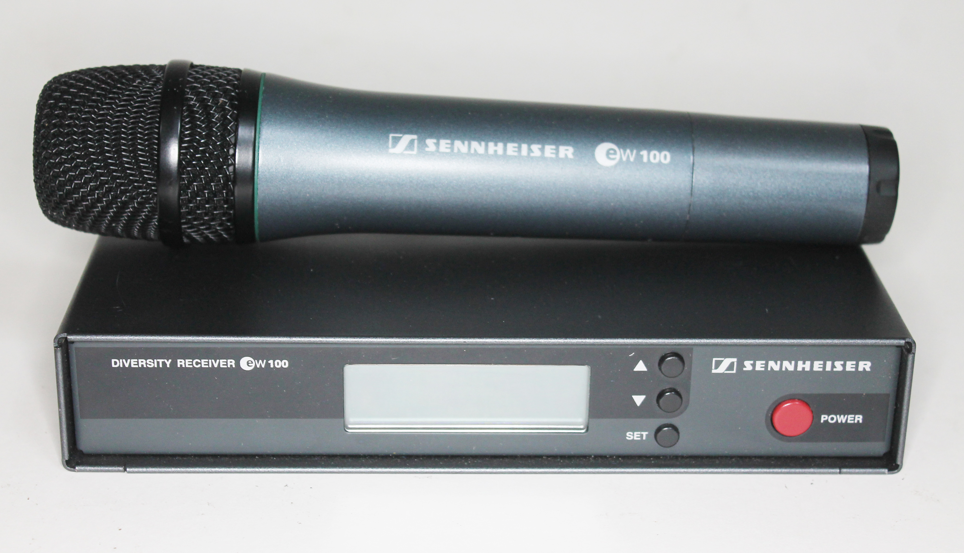 A Sennheiser EW100 wireless microphone with EW100 receiver, case and accessories. Condition - not