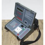 A Seaward IT1000 portable appliance tester.