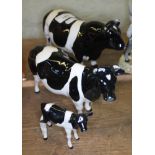 Three Beswick Friesian cattle; Friesian bull 'Ch Coddington Hilt Bar', Friesian cow 'Ch Claybury