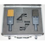 A pair of AKG C414B capacitor microphones, serial no.s 05780 & 19103, with hard case and stand