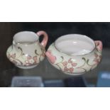 James Macintyre Gesso Faience twin handled sugar bowl and cream jug. Condition - hairline near