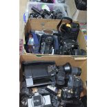 Four boxes of assorted video cameras and spares.