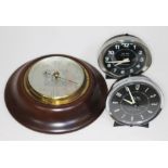 Two vintage Westclox Big Ben Repeater alarm clocks and a Short & Mason barometer.