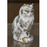 A royal Crown Derby cat paperweight with gold stopper.