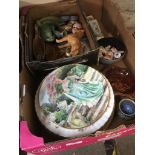 A box of various ceramics to include Wade Whimsies, Sylvac, half dolls and Royal Doulton etc.