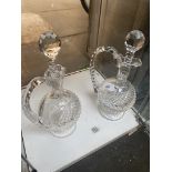 2 similar Claret decanters. 1 marked Waterford, the other unmarked