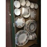 15 pieces of Paragon Country Lane together with a 20 piece Edwardian tea set