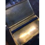 A hallmarked silver cigarette case.