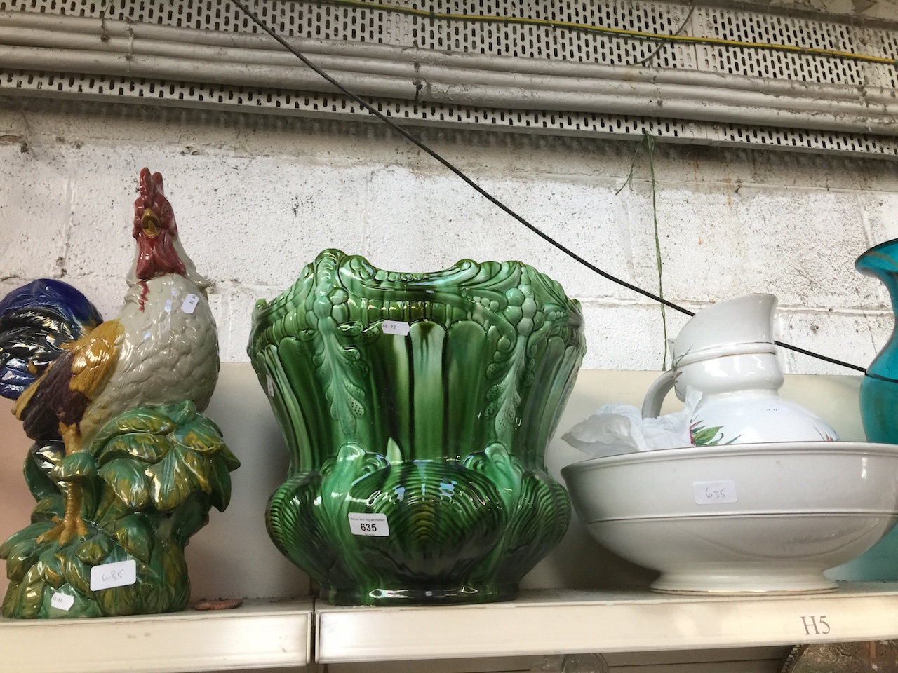 A large ceramic cockerel, a large green planter (As found) and a jug and bowl set