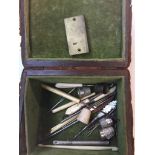 A sewing box with ornated copper top containing haberdashery items to include 2 Charles Horner