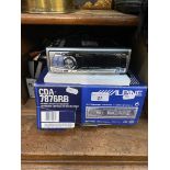 An Alpine CDA-7876RB car radio / CD receiver with mounting kit, manual and box.