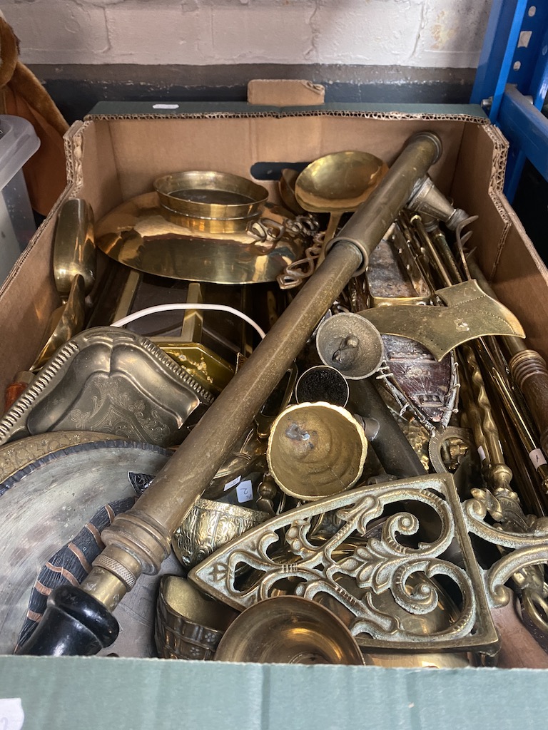 A box of brassware including brass lamp.