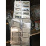 Album of cigarette cards - 15 complete sets including Merchant ships of the world by Wills