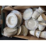 A box of Minton dinerware.