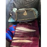 A vintage tartan case containing Masonic regalia.