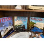 3 decorative tiles depicting Titanic, Flying Scotsman and Mallard.