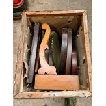 A wooden crate containing toilet mirror parts