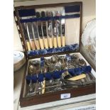 An incomplete canteen containing various hallmarked silver and mainly silver plated cutlery.