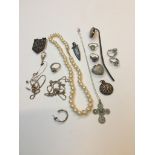 A tray of mainly silver items including pendants, earrings, rings, etc.