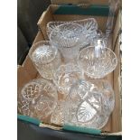 A box of cuty glass including vases, bowls, biscuit jar and tray