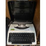 A Brother 100 portable typewriter.