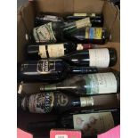 A box of 10 bottles of alcoholic beverages, wine, sherry, creme de menthe, etc - all sealed.