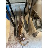 3 walking sticks including one with silver collar and top. Also includes a whip