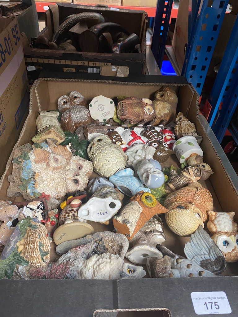 A box of assorted owl ornaments