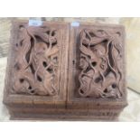 A Chinese carved wood stationary box decorated with dragons.