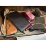 A box of vintage purses