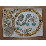 Assorted jewellery including a Modernist hallmarked silver pendant, costume jewellery etc.