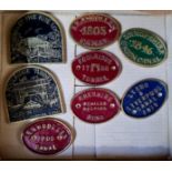A collection of 8 metal plaques related to canals.