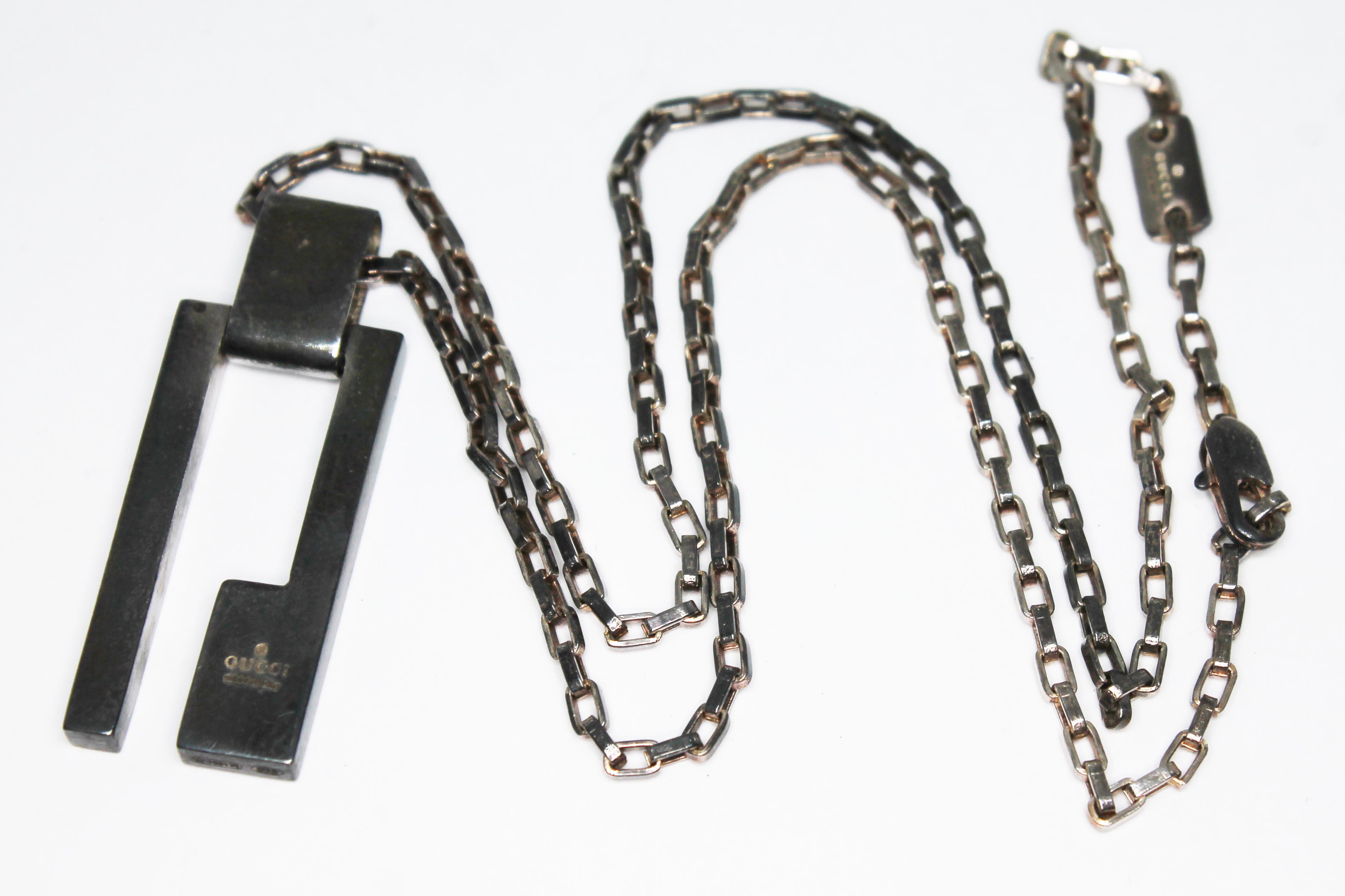 A Gucci pendant necklace, chain length 42cm, marked '925'.