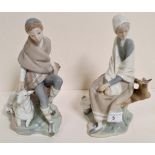 Two Lladro figures: Seated girl with covered basket and small bird on branch; Seated shepherd boy