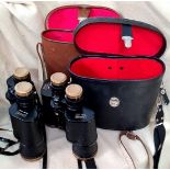 2 pairs of Lancastria binoculars in cases.