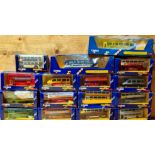 Approx. 16 boxed Corgi die-cast model buses.
