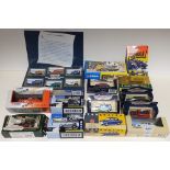 A box containing various die-cast model vehicles including Corgi, Matchbox and Vanguard, all boxed.
