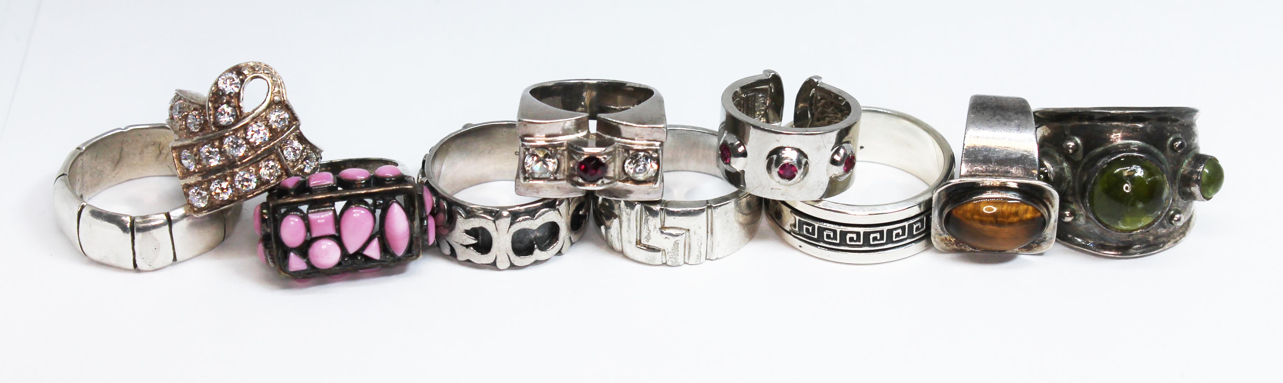 A group of ten rings, various styles, three hallmarked silver, five marked '925' and the unmarked,